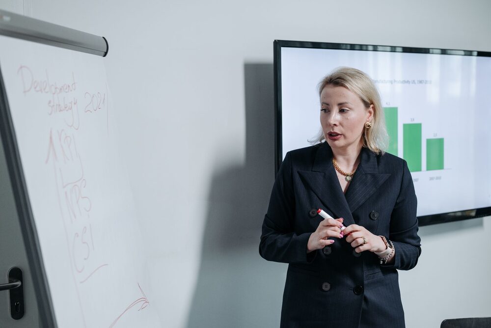 Consultant delivering a strategy presentation to stakeholders